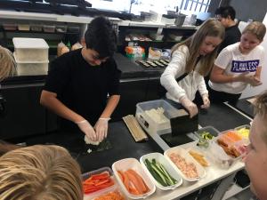 school children making sustainable meals in restaurants