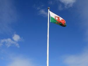 Welsh flag on blue sky